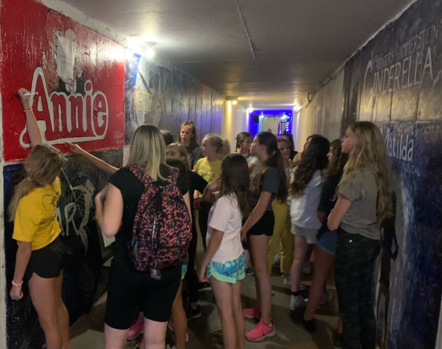 Cast of Annie in tunnel.